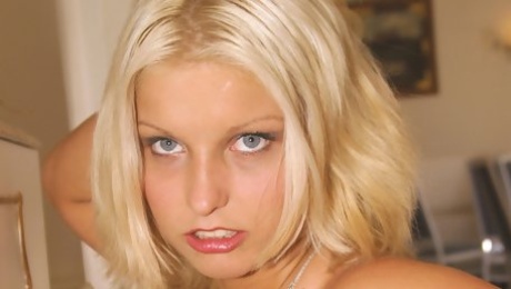 Blonde busty social media bombshell makes men crazy with her blue eyes