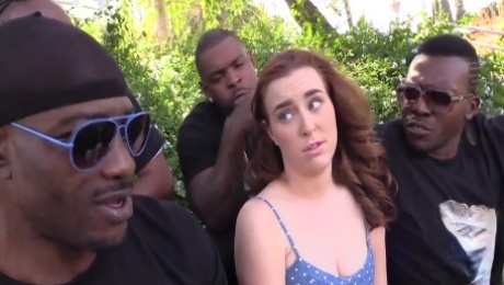 Young redhead chick gets many BBC in wild interracial gangbang