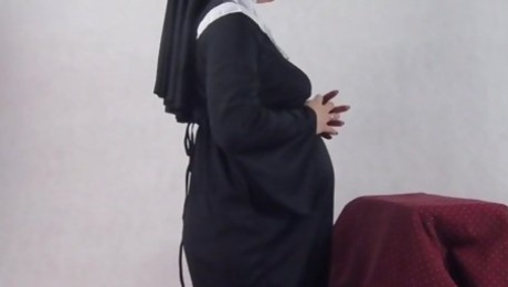 Pregnant nun taken by surprise and fucked from behind